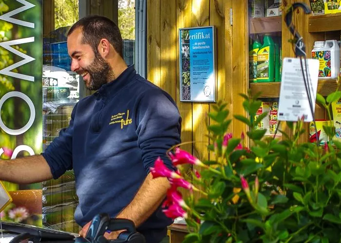 Teammitglied im Bereich Kasse